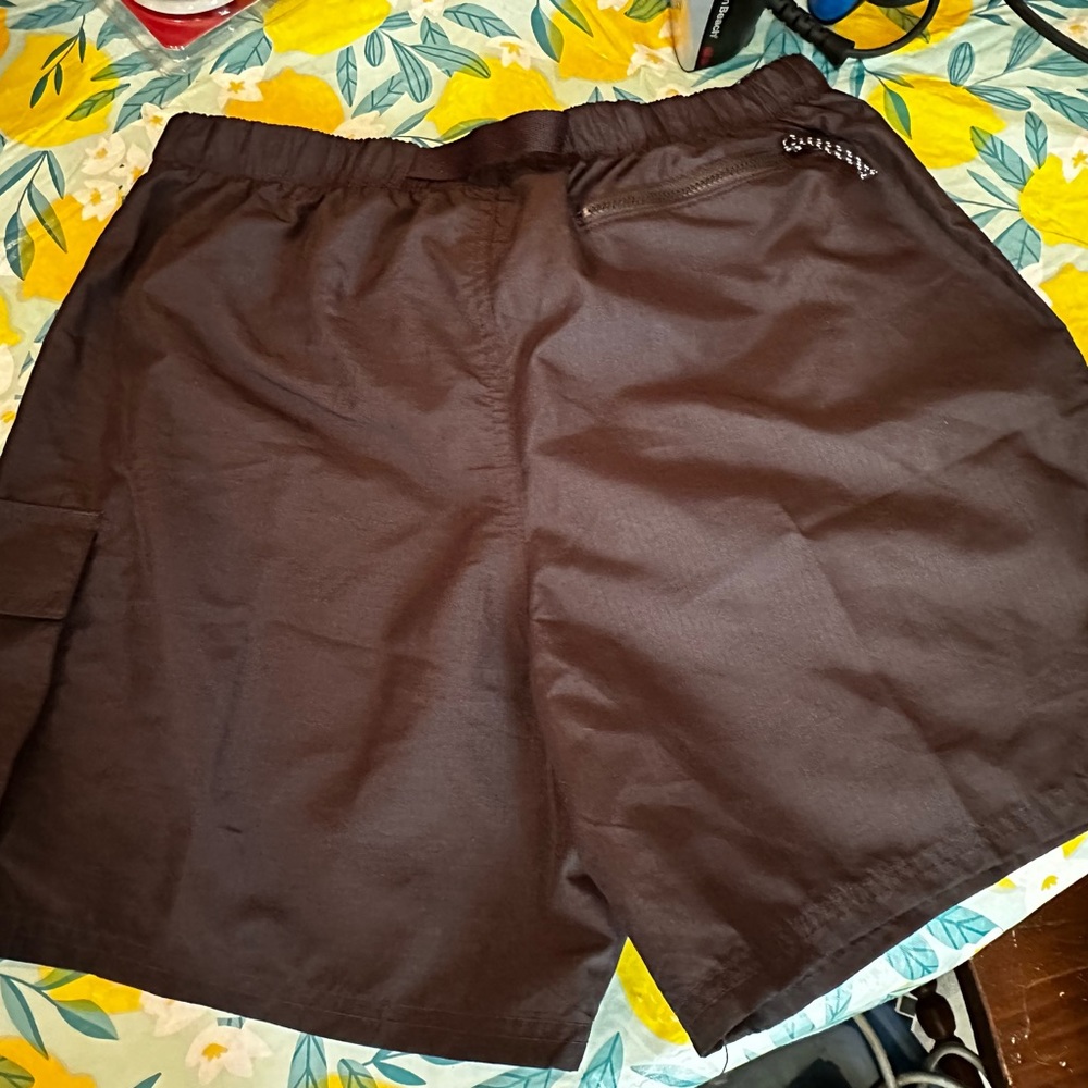 Nike polyester swim shorts with mesh undies inside! Brand new with tags.